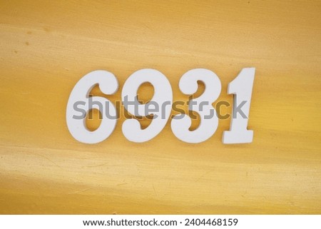 The golden yellow painted wood panel for the background, number 6931, is made from white painted wood.