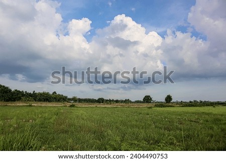 The natural scenery looks very beautiful naturally taken in landscape. You can see white clouds against the blue sky