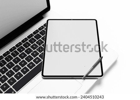 Tablet computer with blank white screen on white background	