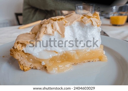 A slice of homemade lemon meringue pie