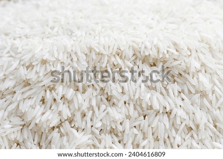 Raw super kernel basmati rice long grain Royalty-Free Stock Photo #2404616809