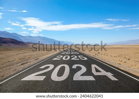 The road ahead into 2024 and beyond Royalty-Free Stock Photo #2404622041