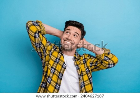 Photo of guy model in checkered stylish shirt want open his own business during take nap look novelty isolated on blue color background