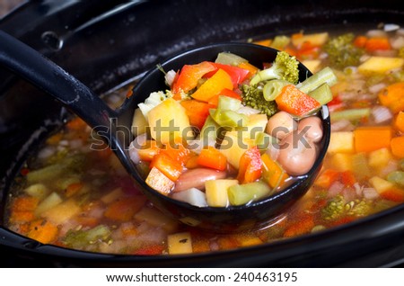 slow cooker vegetable and beans soup Royalty-Free Stock Photo #240463195
