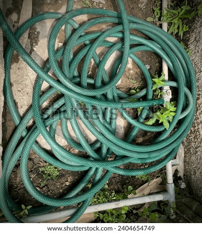 green hose that rotates neatly