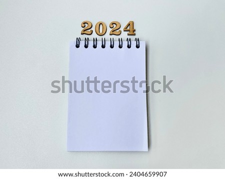 Starting in 2024. Plans for 2024. Blank paper Royalty-Free Stock Photo #2404659907