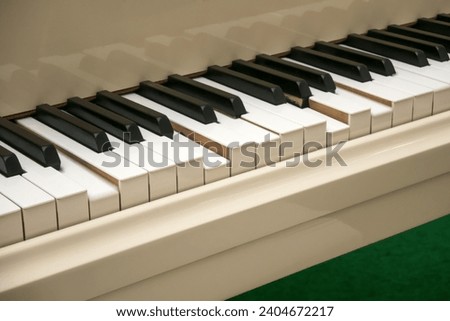 Automatic piano that plays unattended Royalty-Free Stock Photo #2404672217