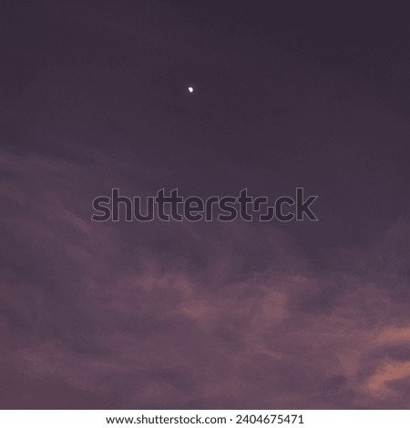 selective focus picture of the moon in the sky 
