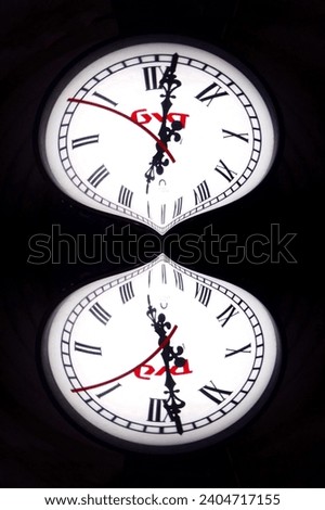 abstract photograph with a clock on a dark background