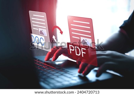 Convert PDF files with online programs. Users convert document files on a platform using an internet connection at desks. concept of technology transforms documents into portable document formats. Royalty-Free Stock Photo #2404720713