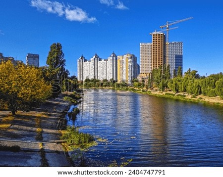 Residential district in Kyiv city, by the river channel of Dnieper Royalty-Free Stock Photo #2404747791