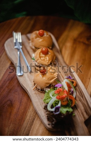A plate of food on a wood surface