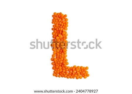 The capital letter 'L' formed from red lentil grains against a clean white backdrop. Perfect for a food blog and menu Royalty-Free Stock Photo #2404778927