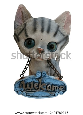Statue of a cat with a sign saying welcome. on a white background.