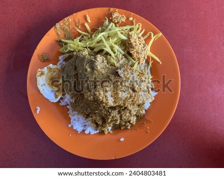 Top down picture of nasi kandar, a malaysian dish