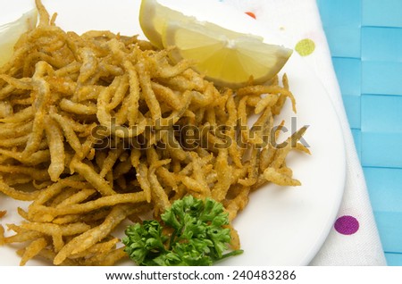 Small fried whitebait served on a plate