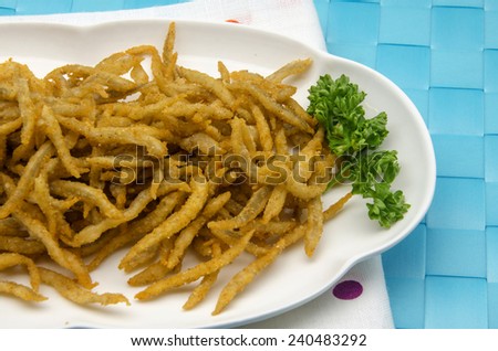 Small fried whitebait served on a plate
