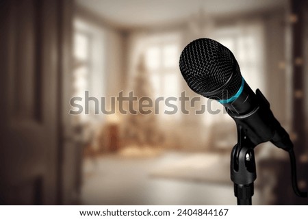 Professional microphone in interior with Christmas ornaments decor