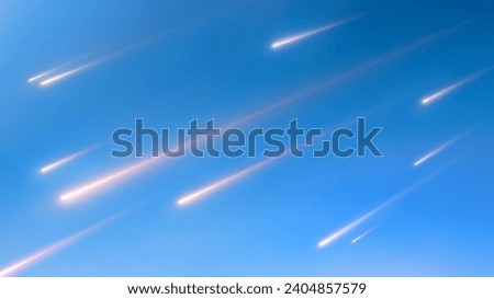 Meteor shower in daylight. Falling meteorites against a clear blue sky. Starfall in the light of the sun.