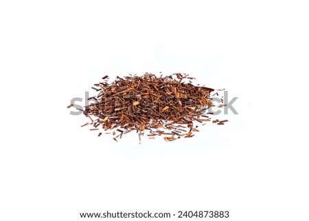 close-up of dry pile of rooibos tea photography, isolated on white background