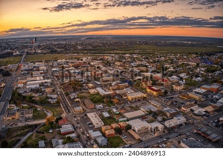 Aerial View of the popular Border Towns of Eagle Pass, Texas and Piedras Negras, Coahuila at Sunset Royalty-Free Stock Photo #2404896913