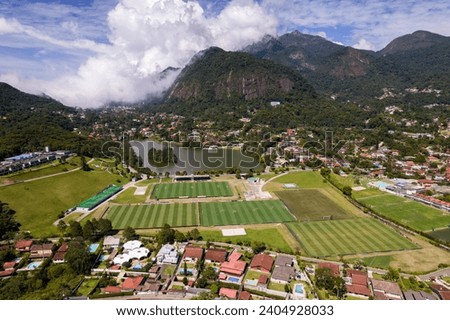 Aerial drone view of the city of Granja Comary in Teresopolis, the headquarters and main training center of the Brazil national football team Royalty-Free Stock Photo #2404928033