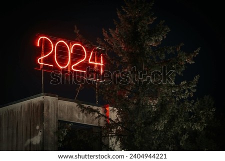 New Year neon illuminated numbers 2024