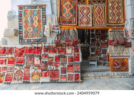 Oriental handmade carpets souvenir and rugs outside of a shop in Bukhara, Uzbekistan