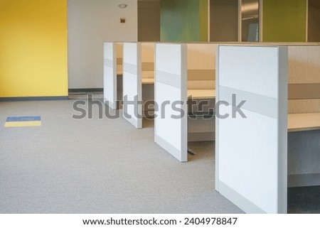 cubicles inside office building, place of work  