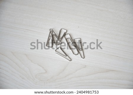                                Collection of paper clips, emphasizing practicality and utility.