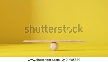 Wooden scales on a yellow background.