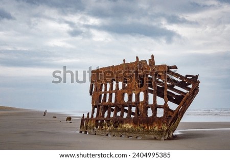 Wreck of the Peter Iredale at Fort Stevens State Park in Oregon, USA Royalty-Free Stock Photo #2404995385