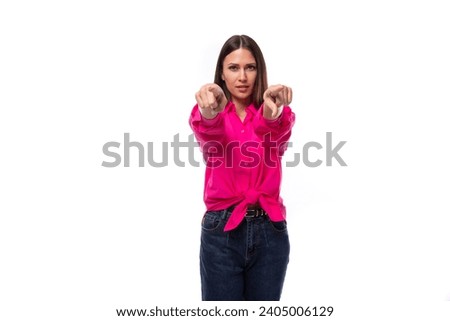 young successful brunette female leader wears bright pink shirt tied at the waist