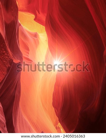 Sunbeams create a breathtaking display of colors in the iconic Antelope Canyon, Arizona, USA