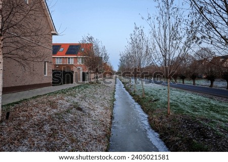 ice on ditches and frost outside in Nieuwerkerk aan den IJssel in the Netherlands