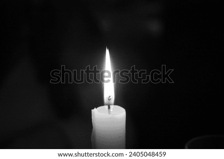 Candle on black or gray background, sad photo - Photo often used at funerals