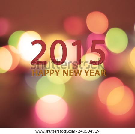 Happy new year 2015 on blurred bokeh lights background