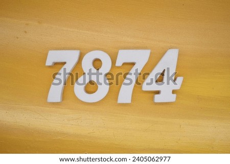 The golden yellow painted wood panel for the background, number 7874, is made from white painted wood.