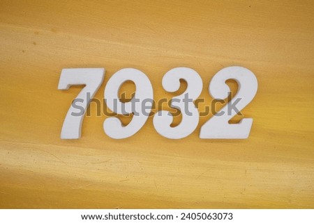 The golden yellow painted wood panel for the background, number 7932, is made from white painted wood.