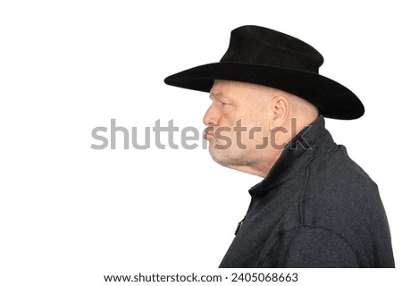 Serious Middle-Aged Cowboy , Farmer Looking Left, Isolated on White Background.