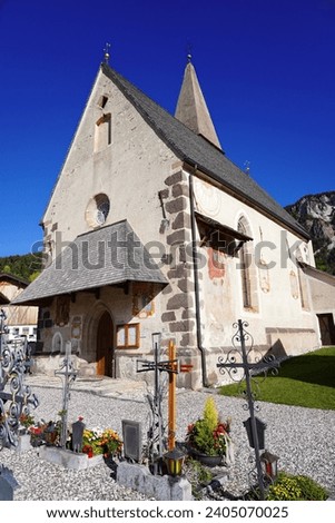 Small church in St. Magdalena or Santa Maddalena in Geislergruppe or Gruppo dele Odle Italian Dolomites Alps mountains Royalty-Free Stock Photo #2405070025