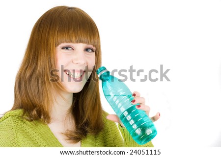 Portrait of an attractive blonde drinking water, isolated on white background