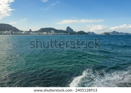 Rio de janeiro Brazil. Copacabana beach and Leme beach with Sugarloaf Mountain in the background. Sea and blue sky.