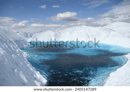 Blue water on Alaskan glaciers is one of the most impressive natural phenomena. This effect occurs due to the nature of glacial ice, which contains