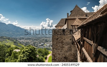 panoramic view of the city of Merano from the hill of the Tyrol castle in South Tyrol, Trentino Alto Adige, South Tyrol, northern Italy Royalty-Free Stock Photo #2405149529