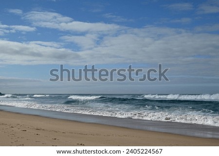 the colours of a beach in sintra portugal on a winter day
