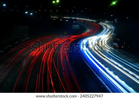 Car lights at night with Long exposure photography technic shutter speed