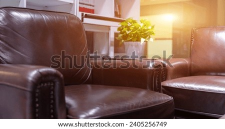 Comfortable leather sofa in reception area of ​​company interior