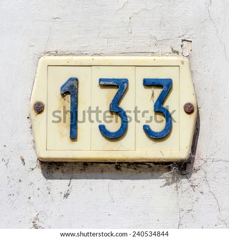 Plastic house number one hundred and thirty three