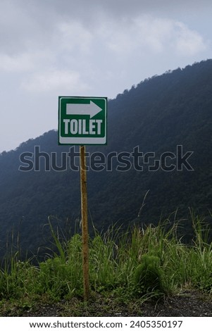 Toilet sign at the top of the mountain.